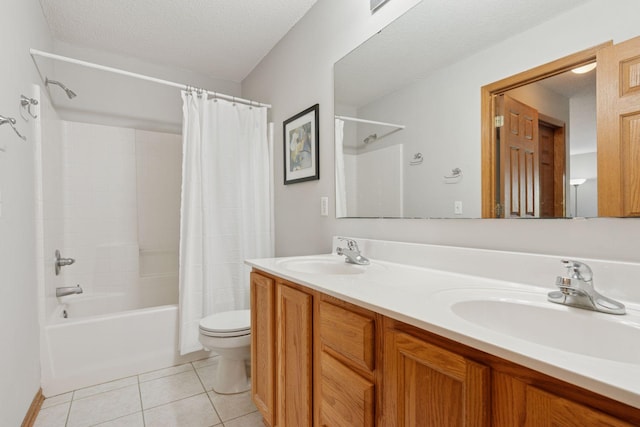 1848 111th Ave NE, Blaine, MN 55449 - full bathroom with shower / bath combo with shower curtain, toilet, tile patterned floors, double vanity, and a textured ceiling