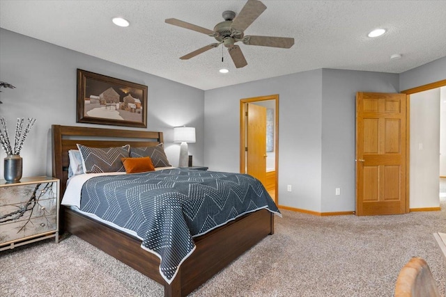 1107 Golden Way NW, Isanti, MN 55040 - carpeted bedroom featuring recessed lighting, baseboards, a textured ceiling, ceiling fan, and connected bathroom