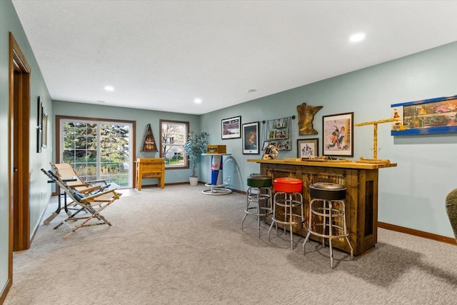 1107 Golden Way NW, Isanti, MN 55040 - indoor dry bar with carpet flooring, baseboards, and recessed lighting