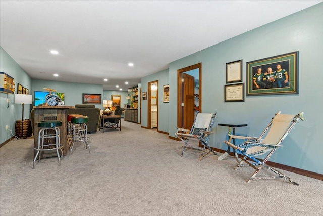 1107 Golden Way NW, Isanti, MN 55040 - carpeted dining space with baseboards, recessed lighting, and a dry bar