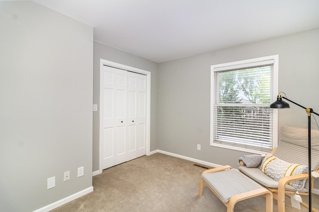 8167 Galway Cir, Woodbury, MN 55125 - sitting room featuring baseboards and carpet flooring