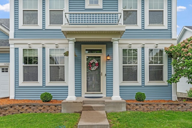 11230 68th St NE, Albertville, MN 55301 - property entrance featuring a balcony