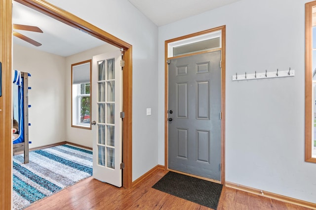 11230 68th St NE, Albertville, MN 55301 - foyer entrance with wood finished floors and a ceiling fan