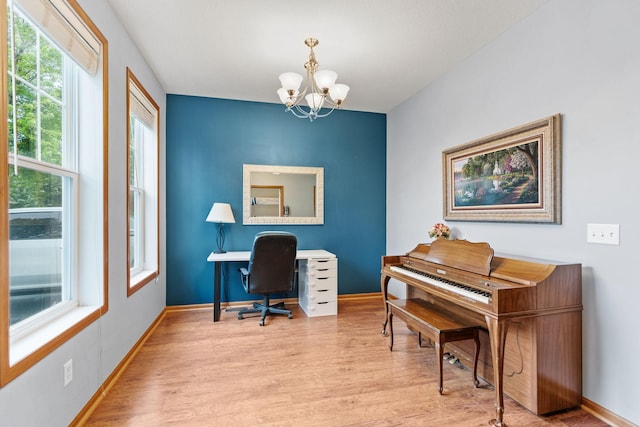 11230 68th St NE, Albertville, MN 55301 - office area with wood finished floors and a chandelier