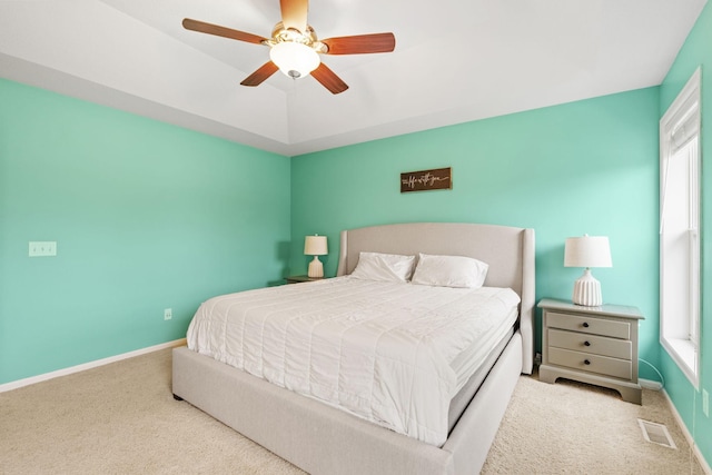 11230 68th St NE, Albertville, MN 55301 - carpeted bedroom with baseboards and ceiling fan