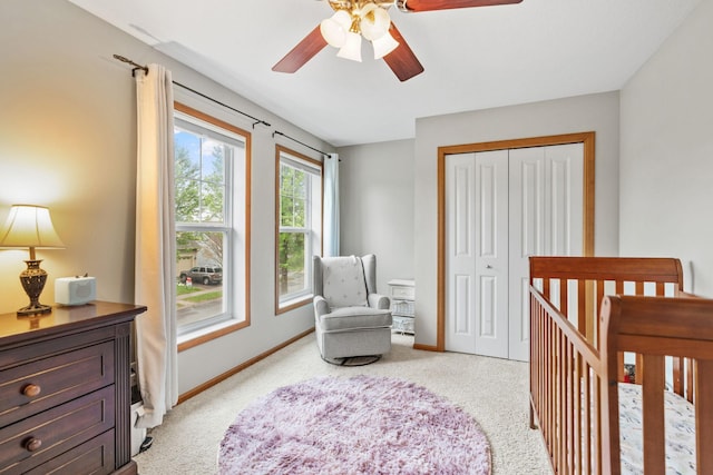 11230 68th St NE, Albertville, MN 55301 - bedroom featuring light carpet, a closet, and a ceiling fan