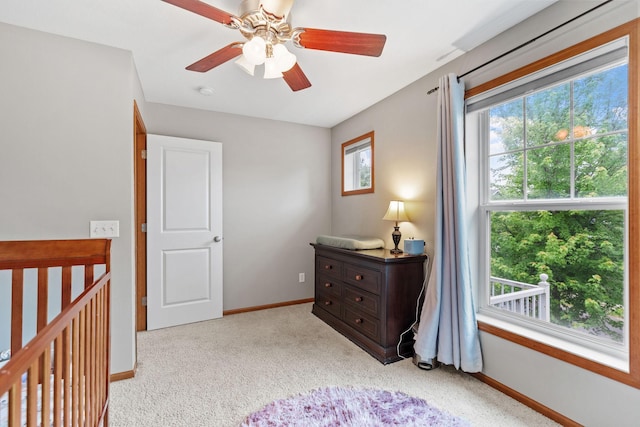 11230 68th St NE, Albertville, MN 55301 - carpeted bedroom featuring baseboards and ceiling fan
