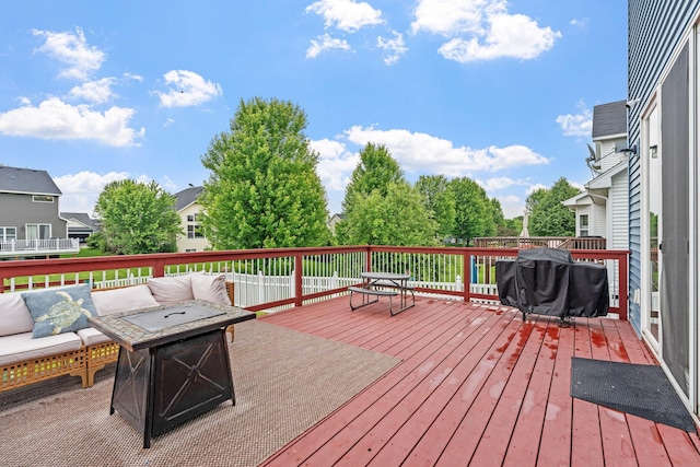11230 68th St NE, Albertville, MN 55301 - wooden deck with an outdoor living space and grilling area