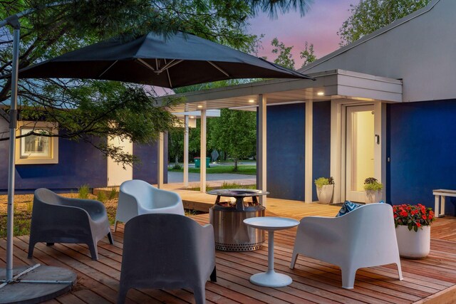 303 77th St, Chanhassen, MN 55317 - view of deck at dusk
