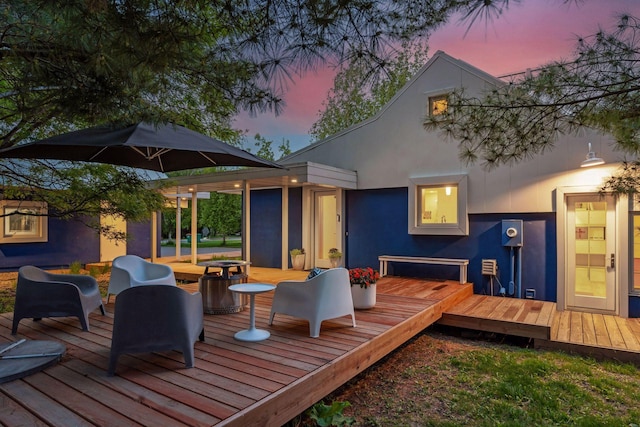 303 77th St, Chanhassen, MN 55317 - view of deck at dusk