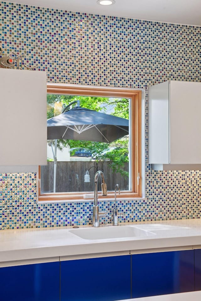 303 77th St, Chanhassen, MN 55317 - bathroom featuring decorative backsplash and vanity