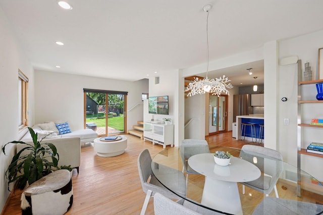 303 77th St, Chanhassen, MN 55317 - dining room featuring a chandelier, light wood-type flooring, and recessed lighting