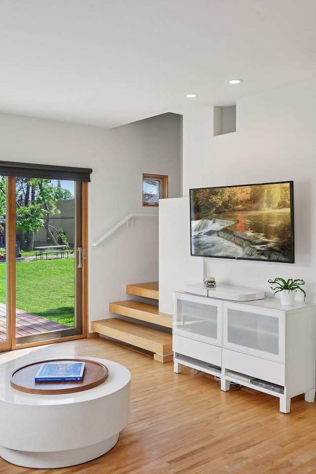 303 77th St, Chanhassen, MN 55317 - living room with wood finished floors, stairs, and recessed lighting