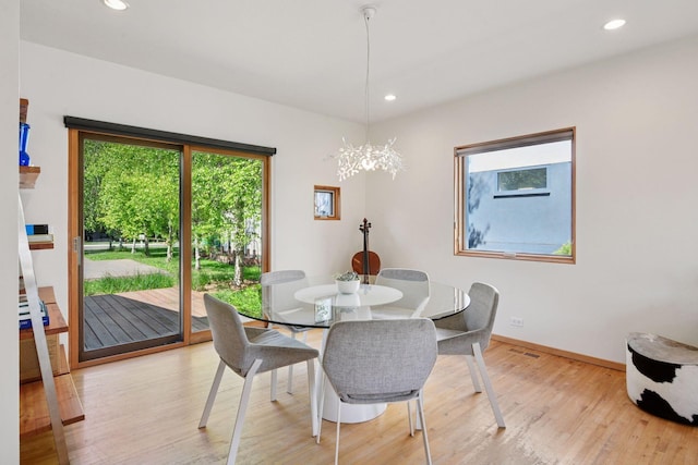 303 77th St, Chanhassen, MN 55317 - dining room featuring light wood-style floors, recessed lighting, baseboards, and a chandelier