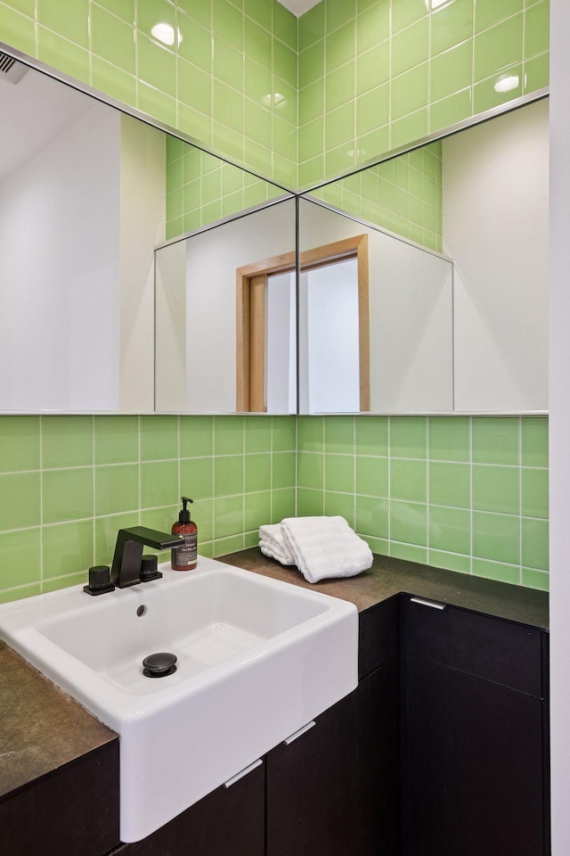 303 77th St, Chanhassen, MN 55317 - bathroom with tasteful backsplash and a sink