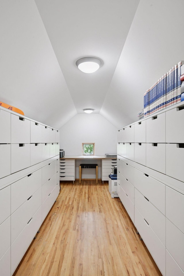 303 77th St, Chanhassen, MN 55317 - spacious closet featuring light wood finished floors and lofted ceiling