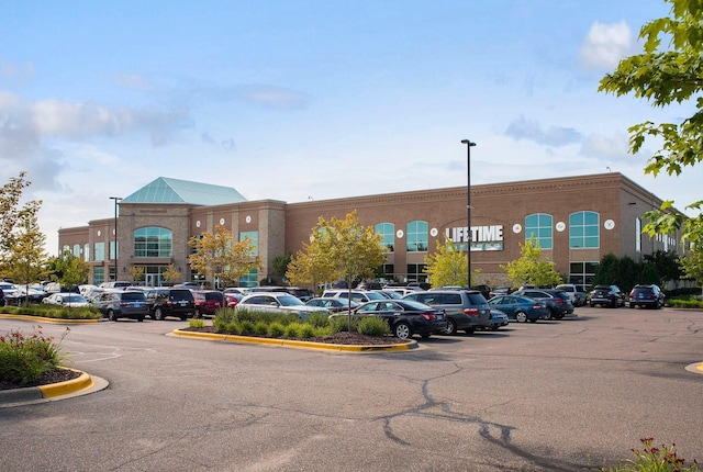 303 77th St, Chanhassen, MN 55317 - view of commercial property featuring uncovered parking