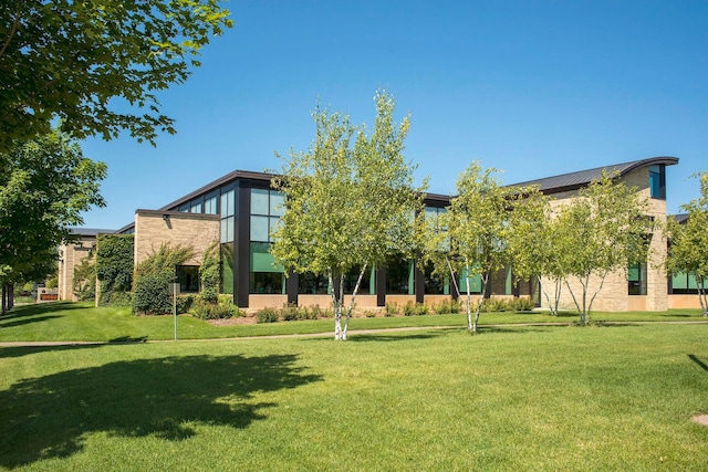 303 77th St, Chanhassen, MN 55317 - view of home's community with a lawn