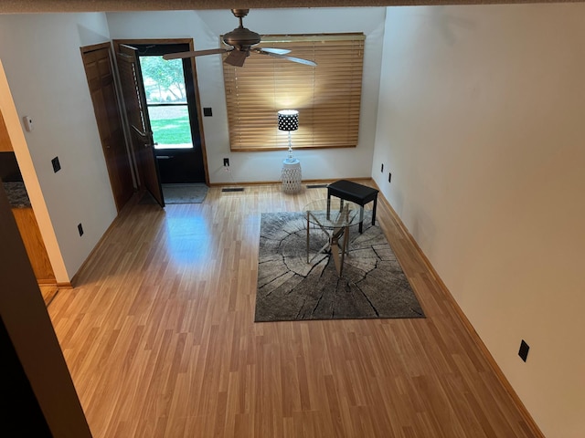 8942 Underwood Ln N, Maple Grove, MN 55369 - dining area featuring light wood-type flooring, ceiling fan, and baseboards