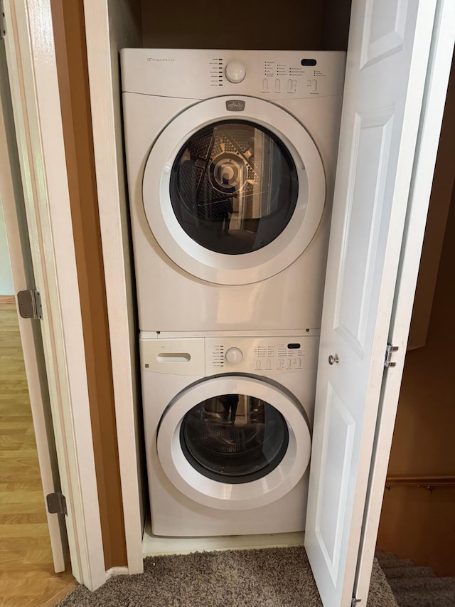 8942 Underwood Ln N, Maple Grove, MN 55369 - laundry area with stacked washer / dryer