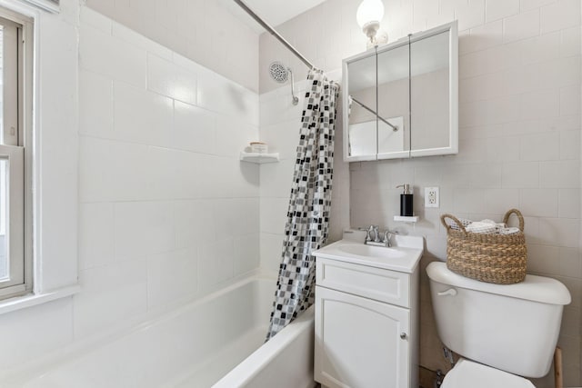1744 Marshall Ave, Saint Paul, MN 55104 - bathroom featuring shower / tub combo, toilet, tile walls, and vanity