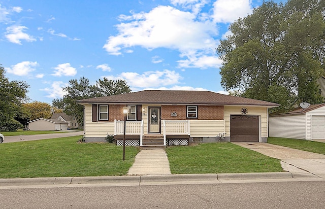 288 Locust St, Dawson, MN 56232 - view of front of home featuring driveway, a front lawn, and a garage