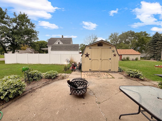 288 Locust St, Dawson, MN 56232 - view of patio with an outdoor fire pit