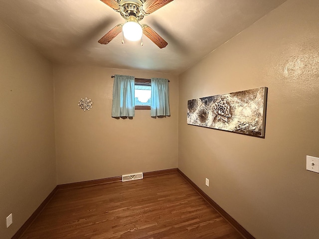 288 Locust St, Dawson, MN 56232 - spare room featuring wood finished floors, ceiling fan, and baseboards