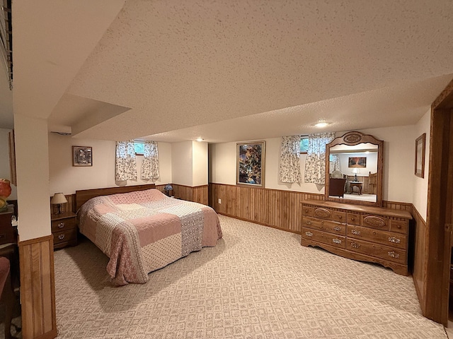 288 Locust St, Dawson, MN 56232 - bedroom featuring a wainscoted wall, carpet, a textured ceiling, and wood walls