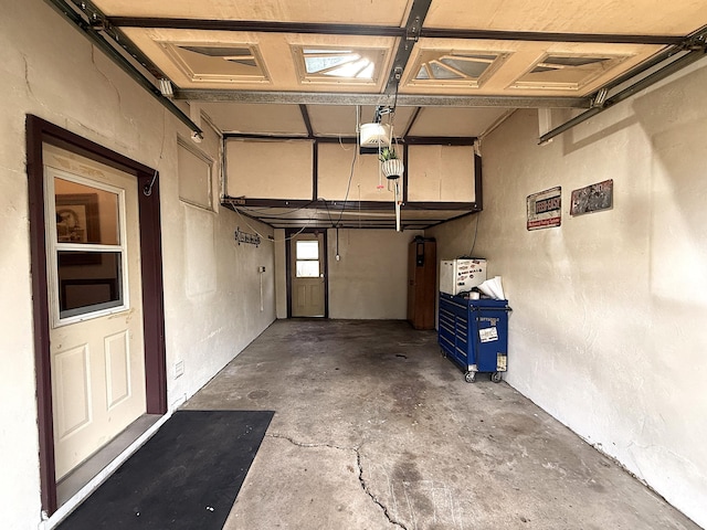 288 Locust St, Dawson, MN 56232 - garage featuring a garage door opener