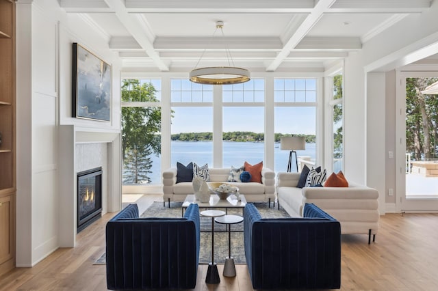 2475 Dunwoody Ave, Orono, MN 55391 - sunroom with coffered ceiling, beamed ceiling, and a water view