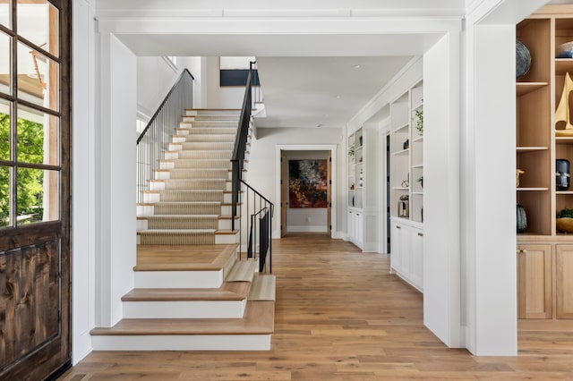 2475 Dunwoody Ave, Orono, MN 55391 - foyer with stairs and light wood finished floors