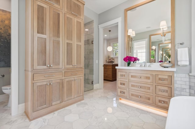 2475 Dunwoody Ave, Orono, MN 55391 - full bath featuring vanity, toilet, and tiled shower