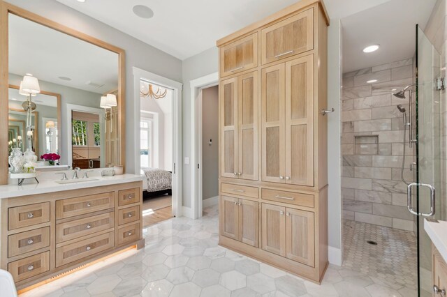 2475 Dunwoody Ave, Orono, MN 55391 - ensuite bathroom featuring vanity, a shower stall, and tile patterned floors