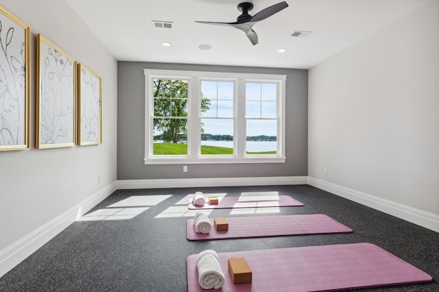 2475 Dunwoody Ave, Orono, MN 55391 - unfurnished room with ceiling fan, carpet, baseboards, a water view, and recessed lighting