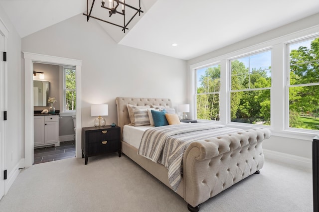 2475 Dunwoody Ave, Orono, MN 55391 - bedroom with multiple windows, baseboards, light carpet, vaulted ceiling, and a chandelier