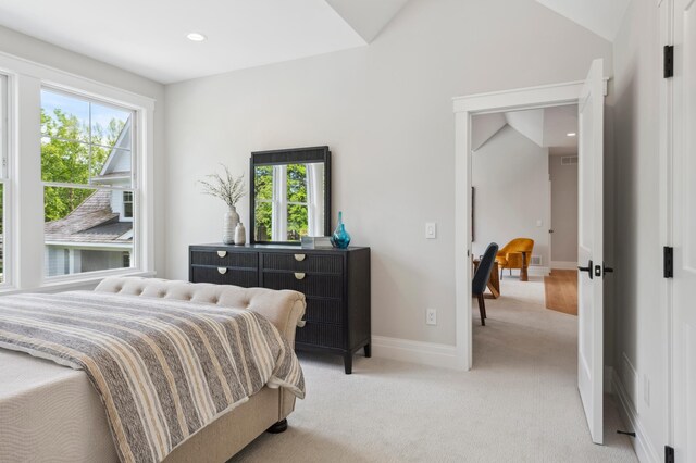 2475 Dunwoody Ave, Orono, MN 55391 - bedroom with multiple windows, light colored carpet, baseboards, and lofted ceiling