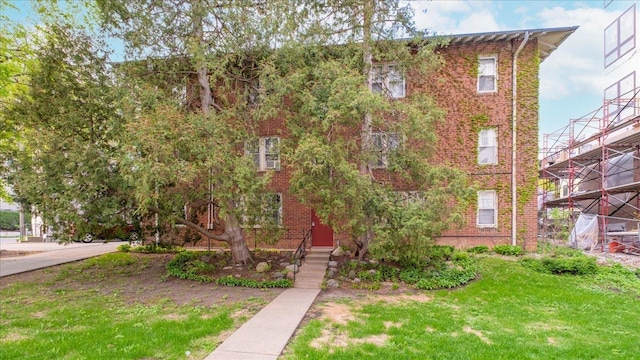 3400 List Pl Unit 1, Minneapolis, MN 55416 - view of front of property with brick siding and a front lawn