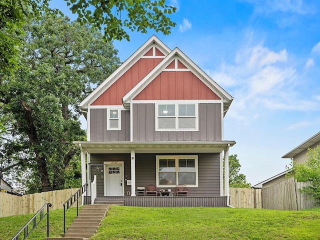 2727 3rd St, Minneapolis, MN 55411 - craftsman-style house with board and batten siding and a porch