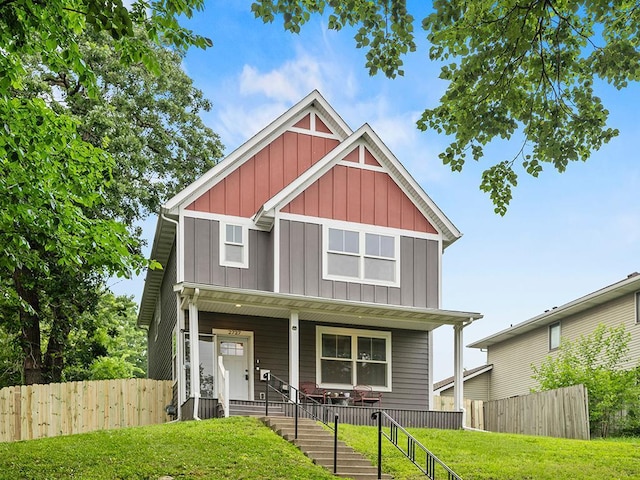 2727 3rd St, Minneapolis, MN 55411 - craftsman-style home with board and batten siding and covered porch