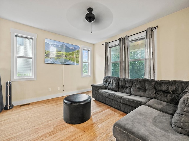 2727 3rd St, Minneapolis, MN 55411 - living room with wood finished floors, plenty of natural light, and a ceiling fan