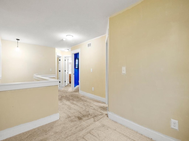 2727 3rd St, Minneapolis, MN 55411 - hall with light colored carpet and an upstairs landing