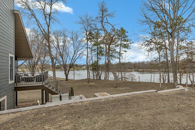 10267 Ferry Point Pl NW, Watab Twp, MN 56367 - view of yard featuring stairs and a deck with water view