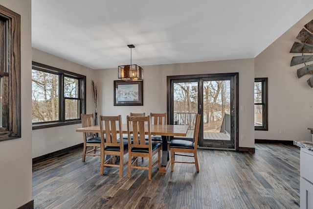 10267 Ferry Point Pl NW, Watab Twp, MN 56367 - dining area featuring dark wood-style floors, baseboards, and a chandelier