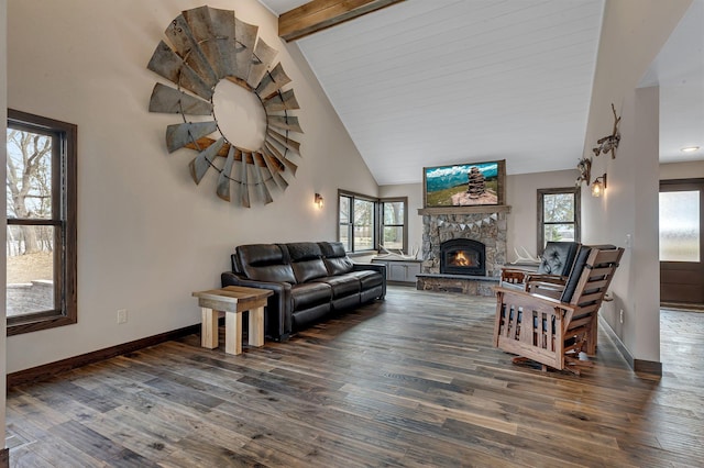 10267 Ferry Point Pl NW, Watab Twp, MN 56367 - living area featuring plenty of natural light, a stone fireplace, baseboards, wood finished floors, and high vaulted ceiling