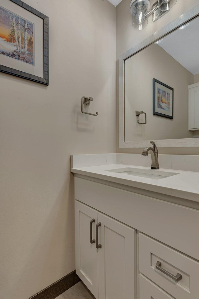 10267 Ferry Point Pl NW, Watab Twp, MN 56367 - bathroom with vanity and baseboards