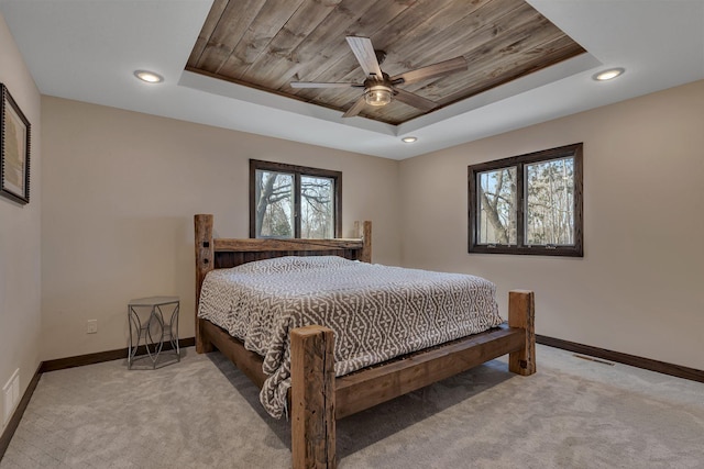 10267 Ferry Point Pl NW, Watab Twp, MN 56367 - carpeted bedroom with a raised ceiling, baseboards, wooden ceiling, recessed lighting, and ceiling fan