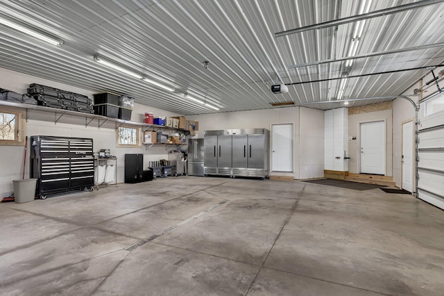 10267 Ferry Point Pl NW, Watab Twp, MN 56367 - garage featuring a garage door opener