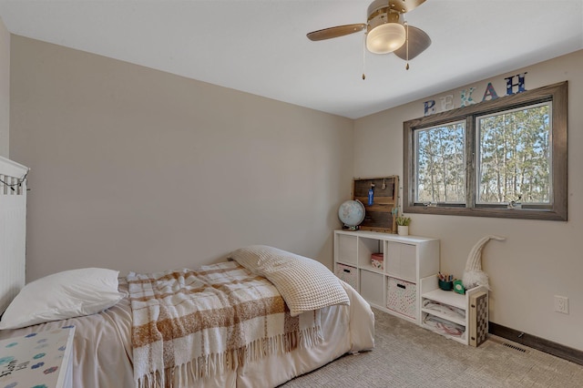 10267 Ferry Point Pl NW, Watab Twp, MN 56367 - carpeted bedroom featuring a ceiling fan and baseboards