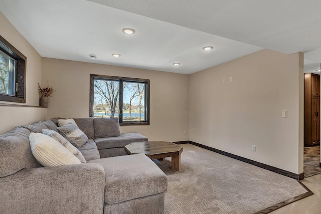 10267 Ferry Point Pl NW, Watab Twp, MN 56367 - living room with recessed lighting, baseboards, and light colored carpet